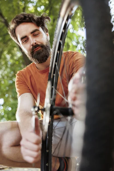 Committed Healthy Active Man Outdoor Showing Dedication Adjusting Securing Bicycle — Stock Photo, Image