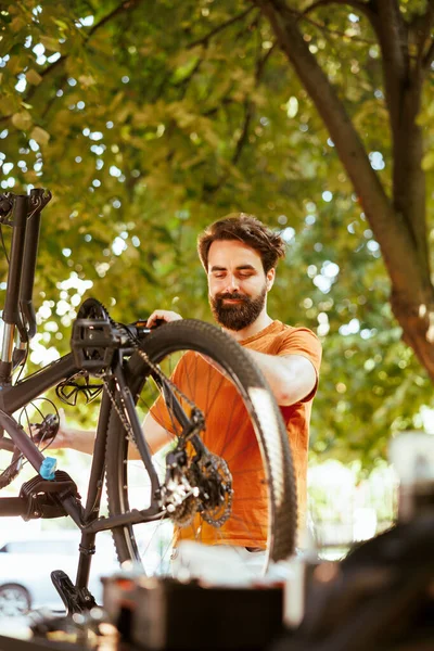 Enthusiastic Male Cyclist Upkeeping Servicing Bicycle Home Yard Dedicated Sporty — Stock Photo, Image