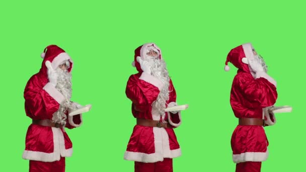 Father Christmas Using Landline Phone Answer Call Standing Greenscreen Backdrop — Stock Video