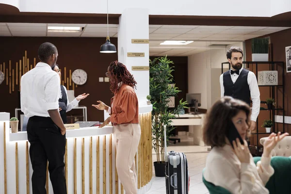 Couple Checking Hotel Reception Asking Receptionist Accommodation Room Reservation People — Stock Photo, Image