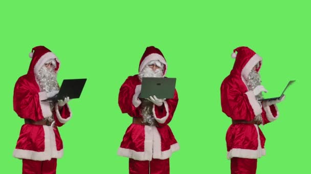 Cool Santa Claus Character Laptop Checking Xmas Naughty Nice List — Stock Video