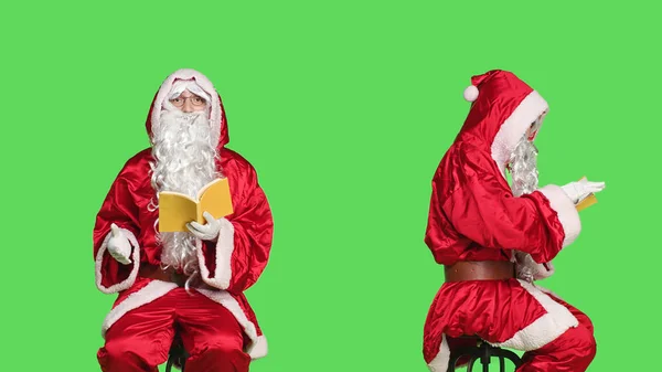 Saint Nick Reads Lecutre Novel Chair Man Dressed Santa Claus — Stock Photo, Image