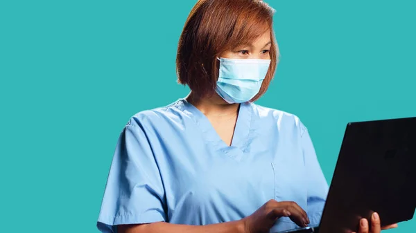 Close Smiling Happy Healthcare Specialist Using Laptop Look Medical Informations — Stock Photo, Image