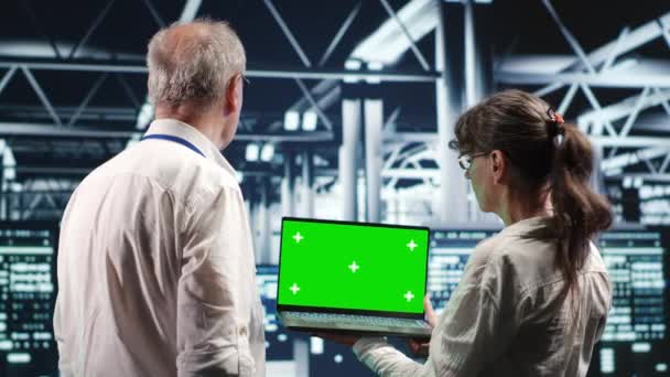 Coworkers Server Room Expertly Managing Data While Navigating Industrial Equipment — Stock Video