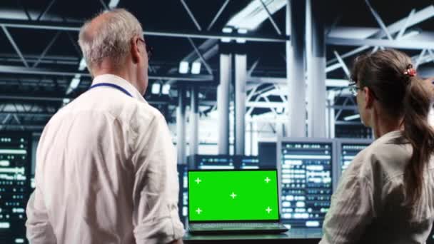 Certified Programmers Looking High Tech Data Center Using Green Screen — Stock Video