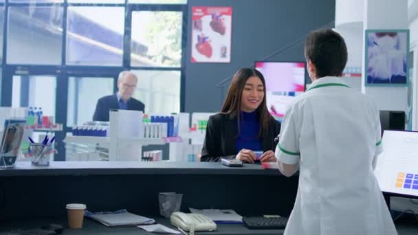 Asian Woman Drugstore Checkout Counter Using Credit Card Purchase Pharmaceutical — Stock Video