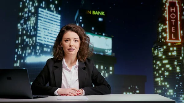 Woman presenter hosting night talk show in newsroom, covering all daily headlines for entertainment. TV broadcaster talking about media reportage live on television, presenting breaking news.