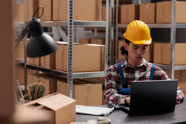 Delivery Service Worker Managing Parcel Shipment Laptop While Working Industrial — Stock Photo, Image