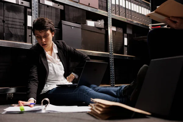 Overworked Inspector Sitting Floor Arhive Room Analyzing Criminology Report Private — Stock Photo, Image