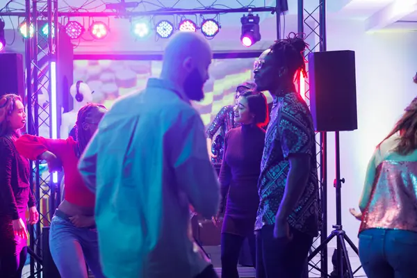 People Partying Crowded Dancefloor Dark Nightclub Illuminated Spotlights Diverse Young — Stock Photo, Image