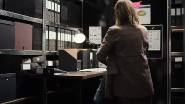 Caucasian Female Inspector Examines Confidential Case Files Records Young Private — Stock Video