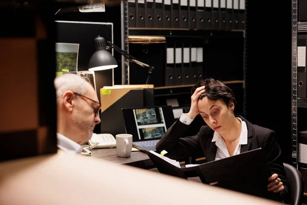 Overworked Private Detectives Working Criminal Case Arhive Room Analyzing Criminology — Stock Photo, Image