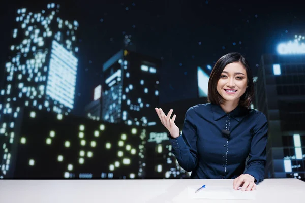 TV show host going live on transmission to create content for global television program, using headlines exclusive from media outlets. Journalist presenter hosting breaking news segment.