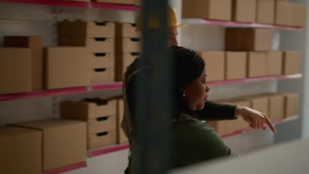 African American Manager Trainee Preparing Warehouse Orders Delivery Using Tablet — Stock Video