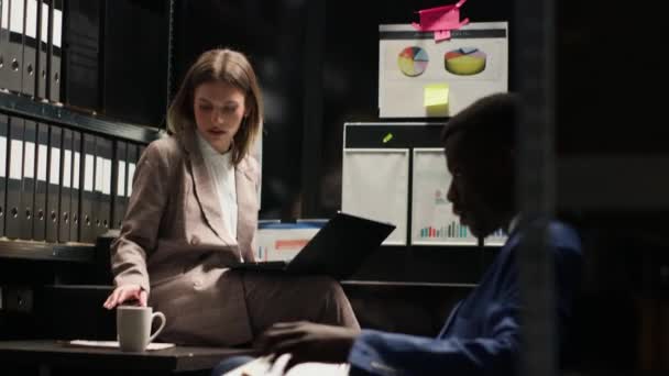 Female Male Investigators Gather Office Discuss Clues Evidence While Diligently — Stock Video