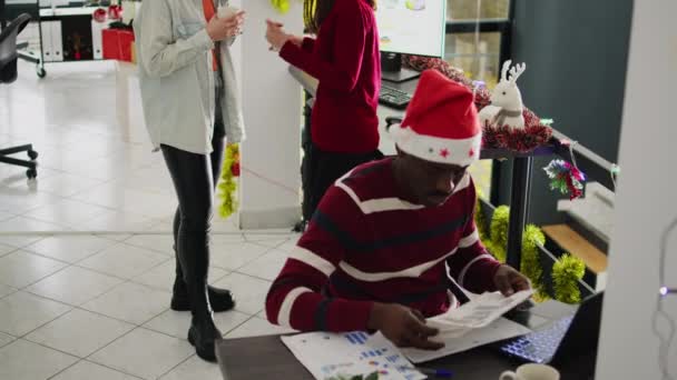 African American Employee Christmas Decorated Office Working Overdue Project While — Stock Video