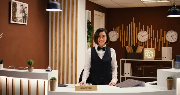 Happy Professional Asian Hotel Employee Taking Phone Calls While Working — Stock Photo, Image