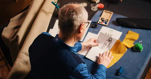 Senior Tailor Choosing Fabric Comparing Sketches Using Modern Clothing Designs — Stock Photo, Image