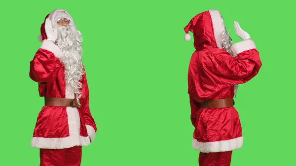 Person Weihnachtsmann Anzug Winkt Hallo Die Kamera Wirkt Fröhlich Und — Stockfoto