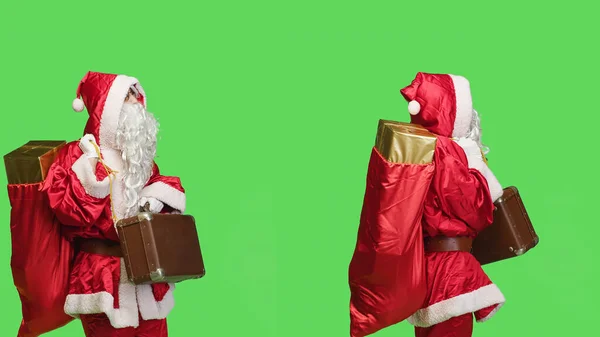 Joyful Adult Disguised Santa Suit Holding Suitcase Waiting Something Studio — Stock Photo, Image