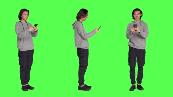 Adult Texting Messages Phone Standing Greenscreen Background Using Social Media — Stock Video