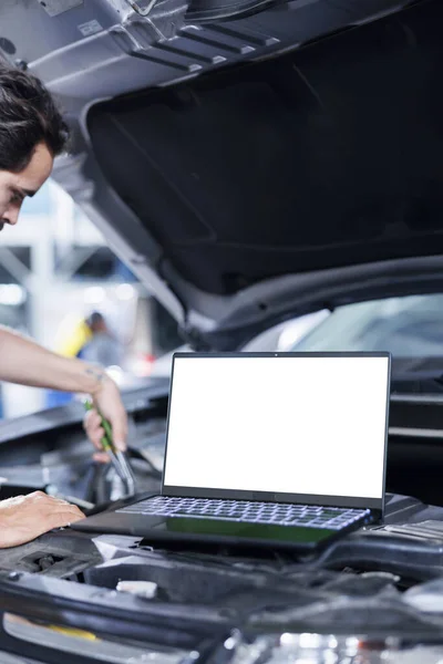 Mockup Laptop Car Hood Open While Mechanic Blurry Background Replaces — Stock Photo, Image