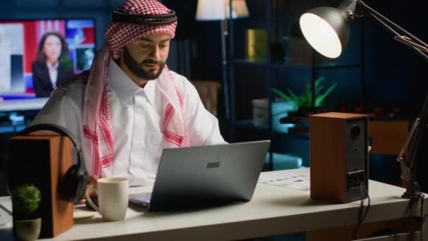 Arab Businessman Typing Laptop Surfing Net While Drinking Cup Coffee — Stock Video