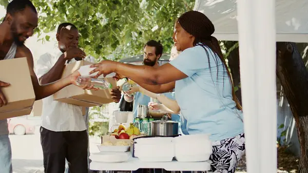 Sunny Day Multiethnic Volunteers Distribute Donations Food Needy Offering Help — Stock Photo, Image