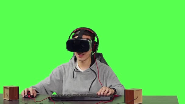 Pov Gamer Enjoying Video Games Sitting Workstation Greenscreen Background Playing — Stock Video
