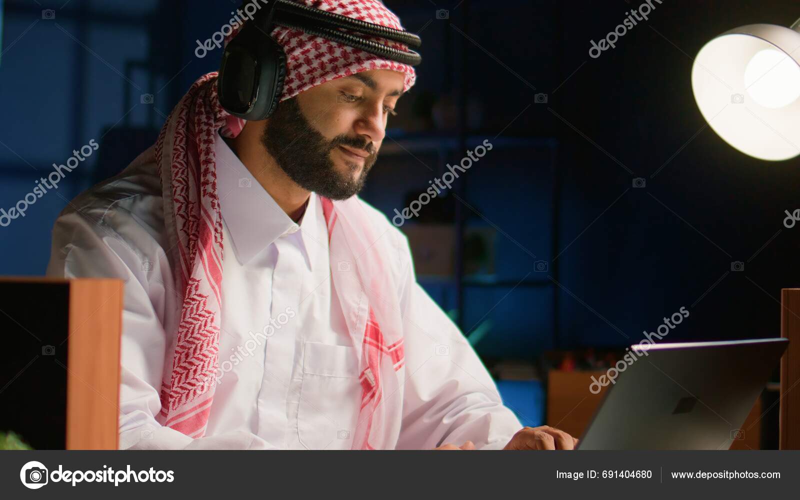 Arabic employee wireless headphones working living room office sending