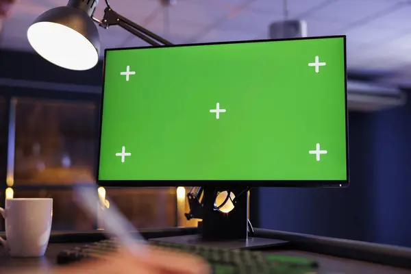 Green screen mock up chroma key computer with isolated display standing on desk in startup office. Executive manager analyzing marketing statistics, working at investment strategy to increase profit