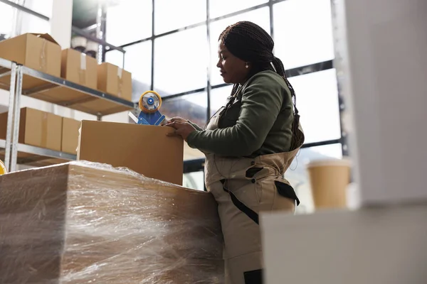 African American Supevisor Taping Clients Orders Using Adhesive Tape Storehouse — Stock Photo, Image