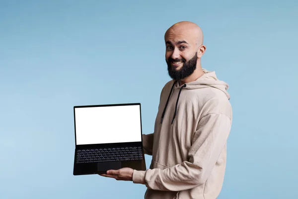 Cheerful Smiling Arab Man Advertising Laptop White Empty Screen Mock — Stock Photo, Image