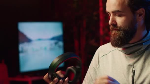Close Shot Man Putting Headphones While Playing Videogames Home Better — Vídeo de Stock