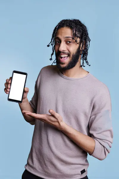 Happy Arab Advertiser Holding Smartphone Blank White Screen App Promotion — Stock Photo, Image