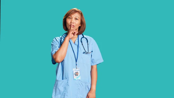 Portrait Stern Serious Asian Nurse Shushing Camera Bothered Excessive Noise — Stock Photo, Image