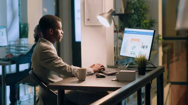 Portrait African American Computer Operator Sitting Desk Nightshift Looking Online — Stock Photo, Image