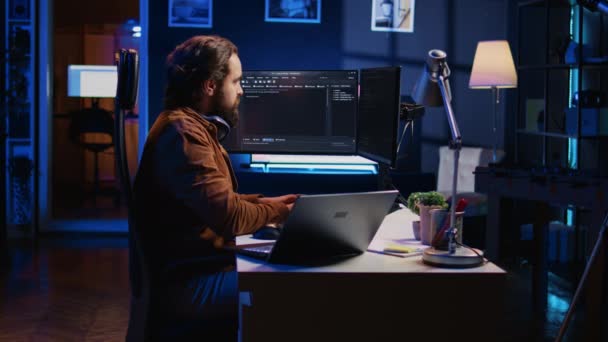 Technician Typing Code Neon Lit Personal Office Using Javascript Programming — Stock Video