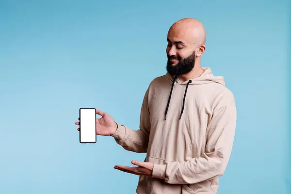 Smiling Arab Advertiser Presenting New Smartphone Blank White Screen Mock — Stock Photo, Image