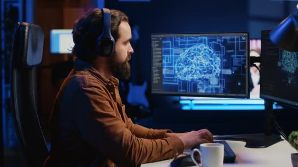 Developer Updating Artificial Intelligence Neural Networks Drinking Coffee Listening Music — Stock Video