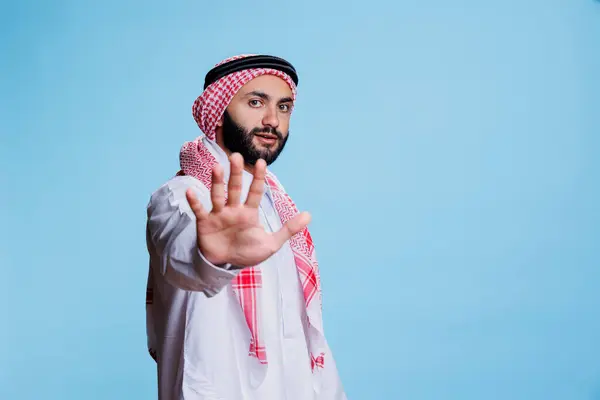 Muslim Man Wearing Traditional Clothes Showing Stop Gesture Hand Looking — Stock Photo, Image