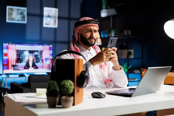 Professional Arab Man Works Office Using Computer Smartphone Online Research — Stock Photo, Image