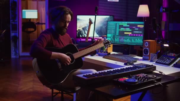 Musician Trying Tune Sound His Guitar Home Studio Adjusting Knobs — Stock Video