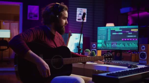 Sound Engineer Playing Acoustic Guitar Using Mixing Console Record Music — Stock Video