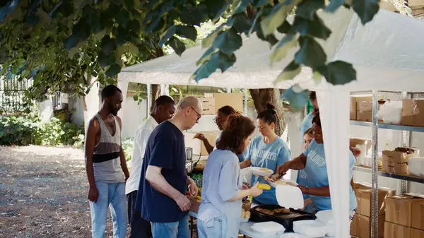 Volunteers Serving Free Food Needy Outdoor Event Non Profit Organization — Stock Photo, Image
