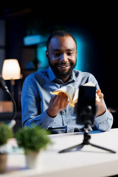 Smartphone Holder Capturing Footage Bipoc Man Reviewing New Book Publisher — Stock Photo, Image