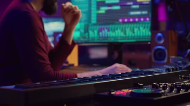 Music Composer Producing Soundtracks Using Stereo Panel Controls Soundboard Twisting — Stock Video