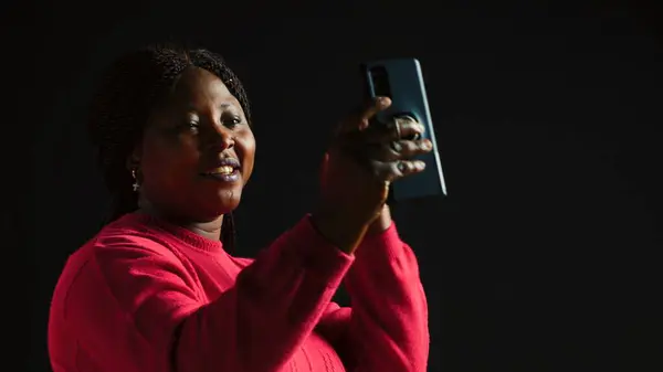 Cheerful Woman Black Background Waving Video Call Her Smartphone Having — Stock Photo, Image