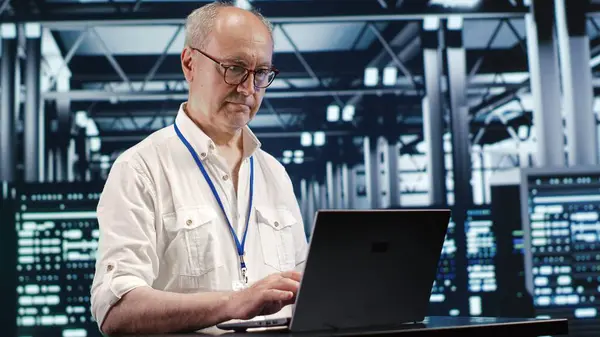 Qualified Developer Expertly Managing Data While Navigating Industrial Server Room — Stock Photo, Image