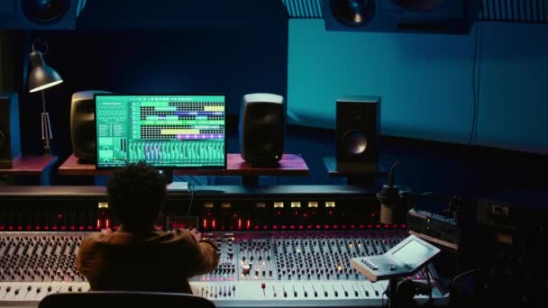 African American Sound Designer Editing Audio Recordings Control Room Working — Stock Video